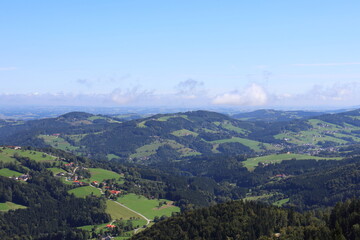 Idyllic panorama of a hilly agricultural landscape, farmland scenery, rural countryside, scenic view