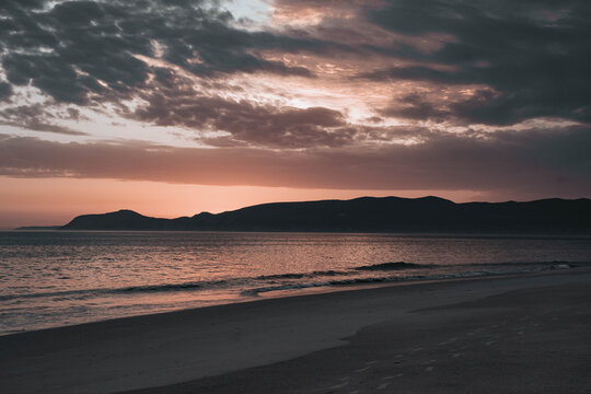 P&ocirc;r do sol na praia