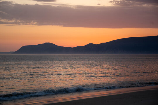 P&ocirc;r do sol na praia
