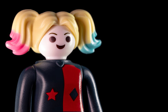 Side view of DC Harley Quinn face on a black background