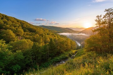 Radiant morning glow over mountain ranges during the summer months