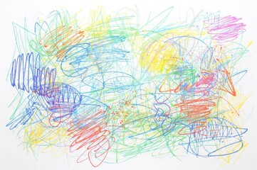 Fototapeta premium Colorful crayon drawings decorating the wall, a child's creative expression