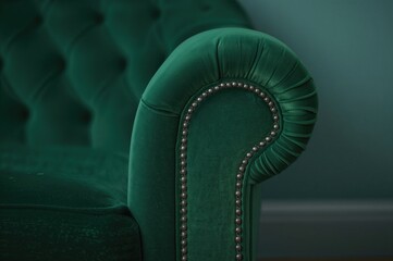 Obraz premium Emerald velour fabric quilted classic sofa backdrop with stitched details.