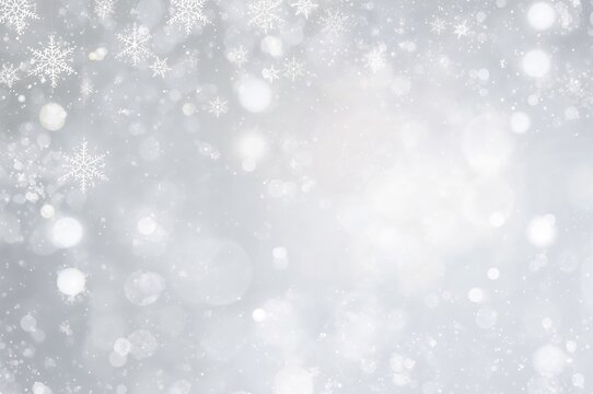 Sophisticated holiday backdrop featuring snowflakes and illuminated area for your message