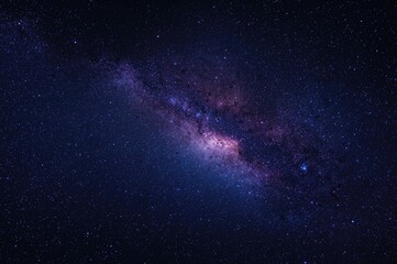 Fototapeta premium A stunning celestial scene featuring purple cosmos and galaxies against a midnight sky.