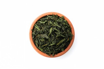 Fototapeta premium Oolong tea with dried leaves in a clay container, Camellia sinensis, dark green tea variety from above, isolated on white
