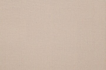 Beige canvas textured background in horizontal or vertical format with natural linen feel and space for text