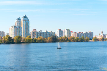 Obraz premium Breathtaking View of Kyiv's Obolon District with Modern Skyscrapers and Serenity