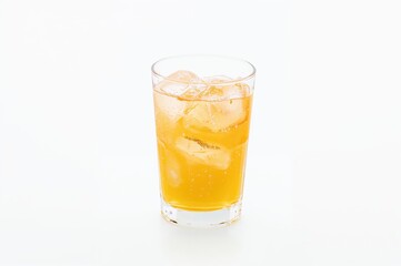 Chilled glass of orange juice with ice cubes on a white backdrop