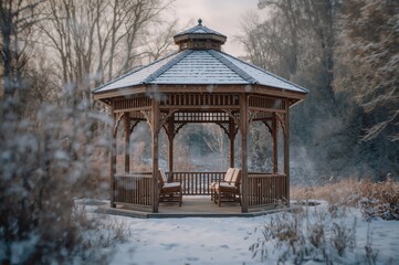 Winter gazebo covered in snow with blurred background