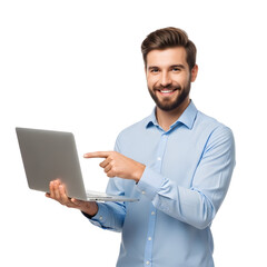 Smiling man in blue shirt pointing at a laptop computer, looking at the camera with a happy expression