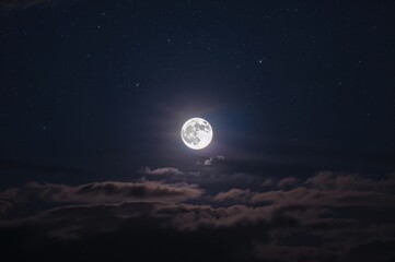 Fototapeta premium Stunning Lunar Glow Brightens the Evening Sky