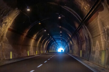 Road transportation on Sicily, Italy, green signs guide to cities by highways, blue signs by city roads. Arrows, distances, and exits help travelers navigate Sicily
