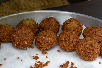 Deep fried vegetarian falafel nut dish balls on food market in Toulouse, France