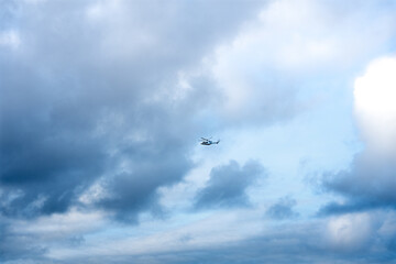 helicopter and clouds