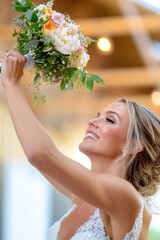 Naklejka premium Joyful caucasian female bride tossing bouquet at wedding celebration