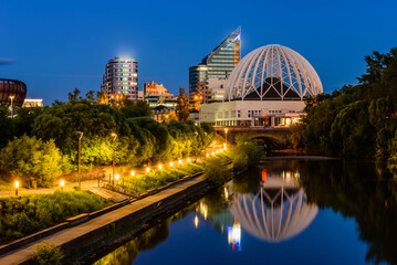 Beautiful Night Cityscape of Yekaterinburg, Russia. Modern Urban Architecture and the Circus Building, Iset River Embankment at Night