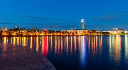 Beautiful Night Cityscape of Yekaterinburg, Russia. Modern Urban Architecture at Night, panorama of the Iset River