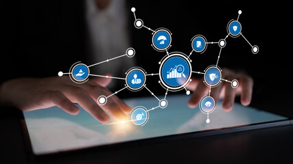 A conceptual image showcasing a person hands on a tablet, interacting with digital icons that represent analytics, growth, and data visualization. Tessel