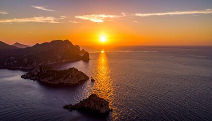 Dramatic sunset over a rocky coastline