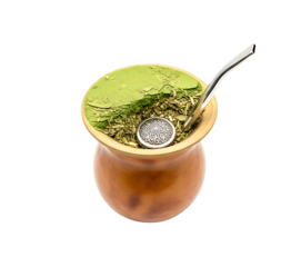 Traditional Yerba Mate Cup: A close-up shot of a traditional yerba mate cup, filled with yerba mate leaves and a metal straw, embodying a moment of relaxation and cultural tradition. 