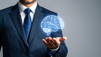 Businessman holding holographic brain icon symbolizing innovation and knowledge