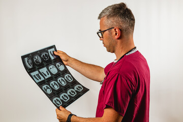 Doctor examines medical images in a clinical setting