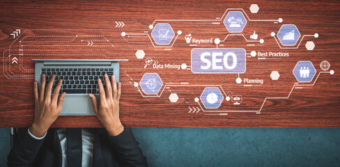 Focused scene showcasing a hands-on laptop with SEO strategy elements, featuring data mining and...