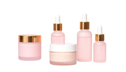 Pink cosmetic containers, various sizes and shapes, including jars and bottles with droppers, display skin care products