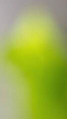 Yellow Green Glow on Pale Gray. Abstract Blurred Gradient with Organic Silhouette modern background