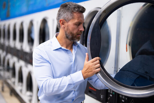 Tight schedule and time management. Effective planning in schedule. Well-organized man in laundry. Work-life balance. Overloaded schedule for busy business man. Tight schedule. Busy office worker.