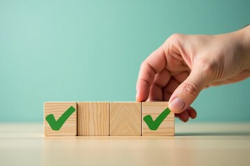 Quality control and successful task completion concept. Hand places a wooden block with green check mark for approval.