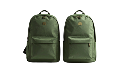 Two matching olive green backpacks, side-by-side. Each features a simple design with multiple pockets, and adjustable straps