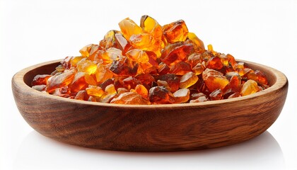 Crushed Amber In The Wooden Bowl Isolated On White Background