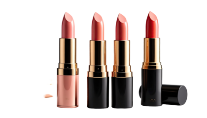 Four lipstick tubes in varying shades of pink and red, presented in a horizontal row. Gold accents and black casings.  A small sample of a light peach shade is visible to the lower left