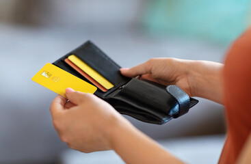 Unrecognizable Female Holding Leather Wallet And Taking Out Bank Credit Card With Contactless Payment Option, Young Woman Managing Finances, Ready To Make Payment, Cropped Shot