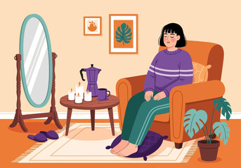 Woman relaxing in armchair with coffee and candles, cozy home atmosphere