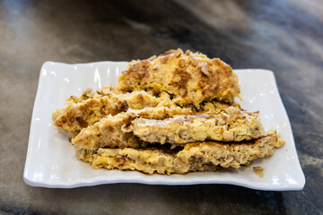 Chai poh egg or fried egg omelette with radish is a simple and popular teochew dish in Malaysia