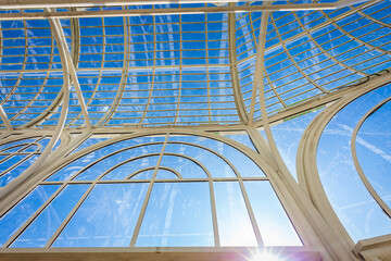 Botanical Garden of Curitiba on a sunny day with blue sky and lush tropical vegetation