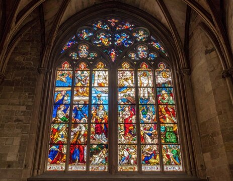 Ornate stained glass in arch