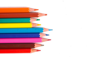a set of colorful pencils isolated on a white background