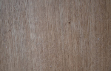 A wooden surface with a grainy texture