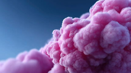 Pink clouds form in a bright blue sky during sunset