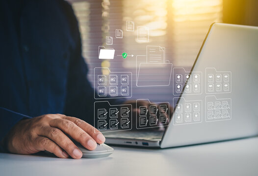 Systematic data storage, Folder hierarchy structure, Document management system DMS, Saving and classifying files, Digital file, Storage secure, Businessman selecting files on cloud and using laptop
