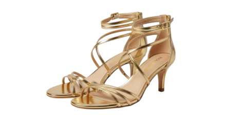 Elegant pair of golden strappy heeled sandals for fashion and style isolated PNG with Transparent Background