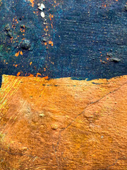 A painting of a wall with a blue and orange stripe