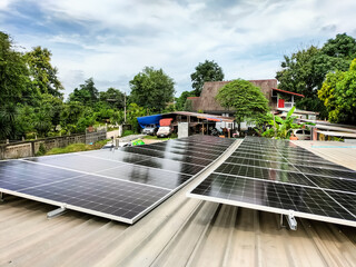 Installing solar panels on the roof to use as alternative energy for electricity.