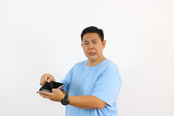 Sad asian Man Shows Empty Wallet Financial Problem