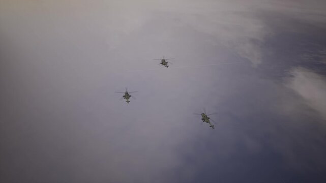 Military Attack Helicopters Firing Or Flying In High Altitude Combat Formation