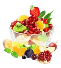 colorful fruit salad in a glass bowl surrounded by fresh mixed fruits